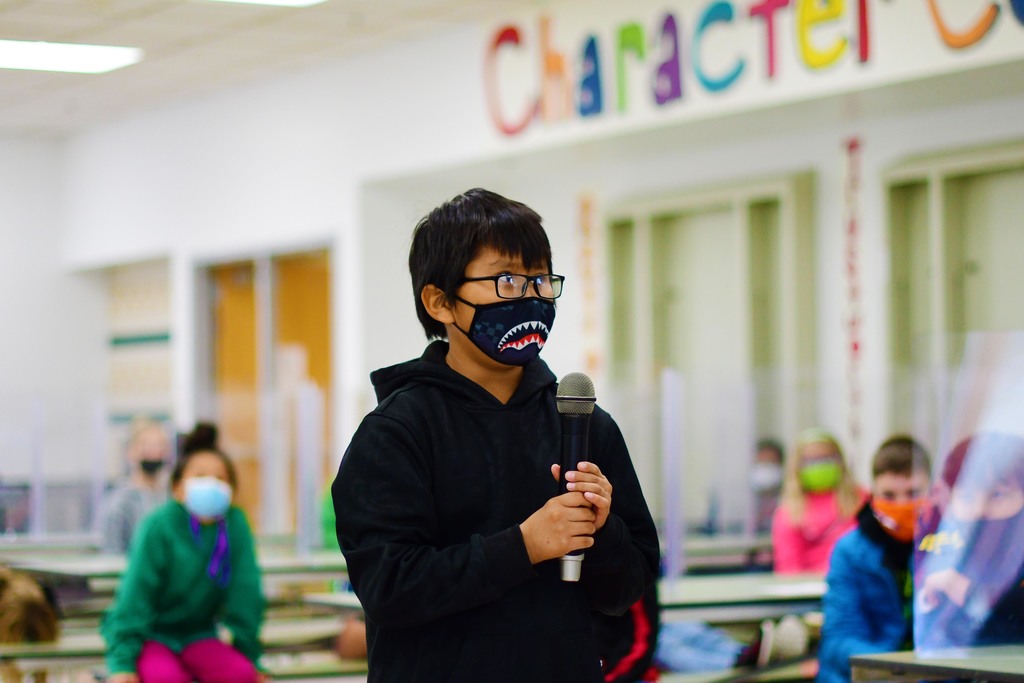 A student competes at Ladera's Spelling Bee.