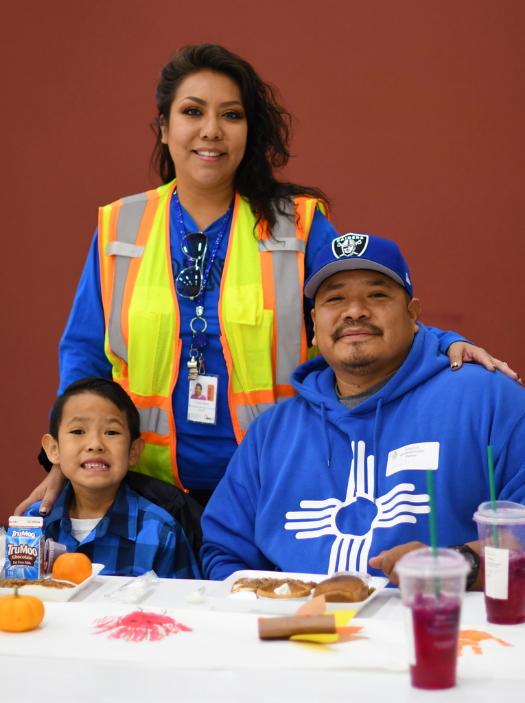 The Begay Family eating together at Apache Elementary School.